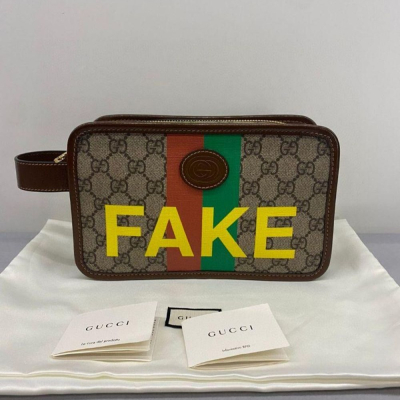 二手99新Gucci 古馳Fake Not系列字母條紋印花老花logo皮革徽標拼皮手拿包
