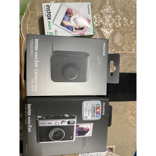 Evo相機黑色加皮套 黑色。在底片20張 共7100元