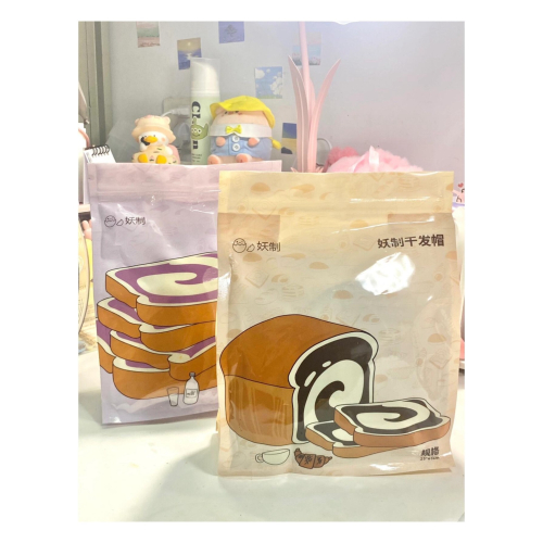 戴栗ლ妖制吐司乾髮帽?油頭少女實現洗頭自由