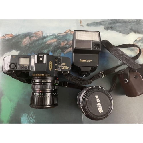 少用終年在除濕箱中 含T70中文說明書但需要整修1⃣️CANON T70單眼相機原廠35-70鏡頭2⃣️Nikon長鏡頭