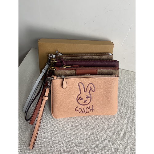 （momo shop）Coach 蔻馳 新款皮夾 中夾 女士牛皮翻蓋按釦長款錢包 時尚手拿包 多卡位錢夾 卡包